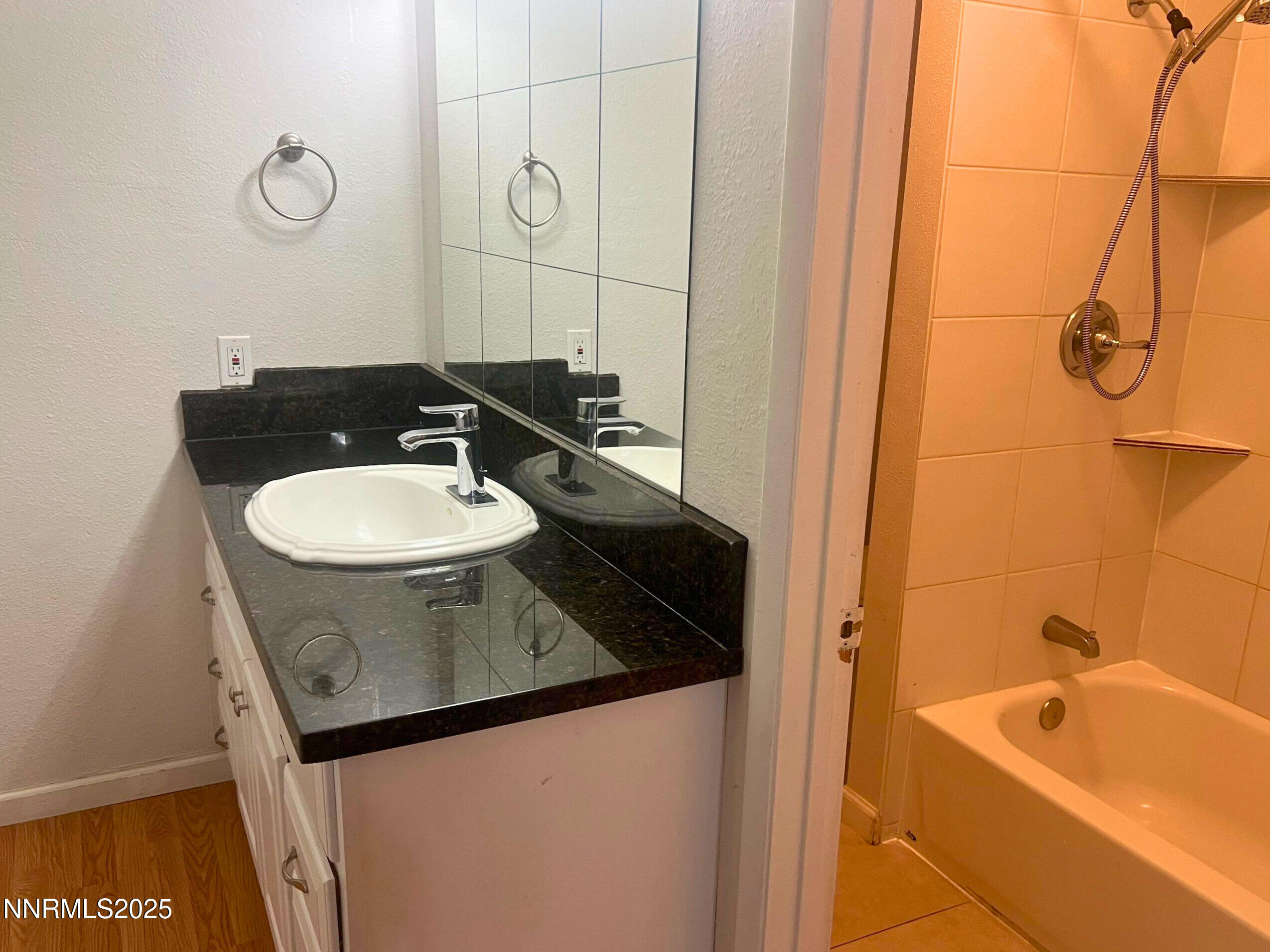 1995 Trainer Way Reno, NV 89512 - Photo 5 of 11 a bathroom with a sink and a mirror