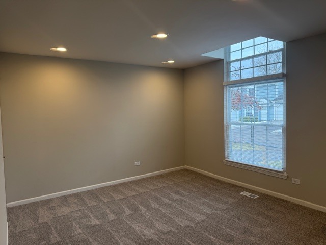 588 Nantucket Way, Unit 2 Island Lake, IL 60042 - Photo 19 of 29 an empty room with windows