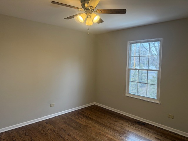 588 Nantucket Way, Unit 2 Island Lake, IL 60042 - Photo 23 of 29 an empty room with windows and chandelier fan