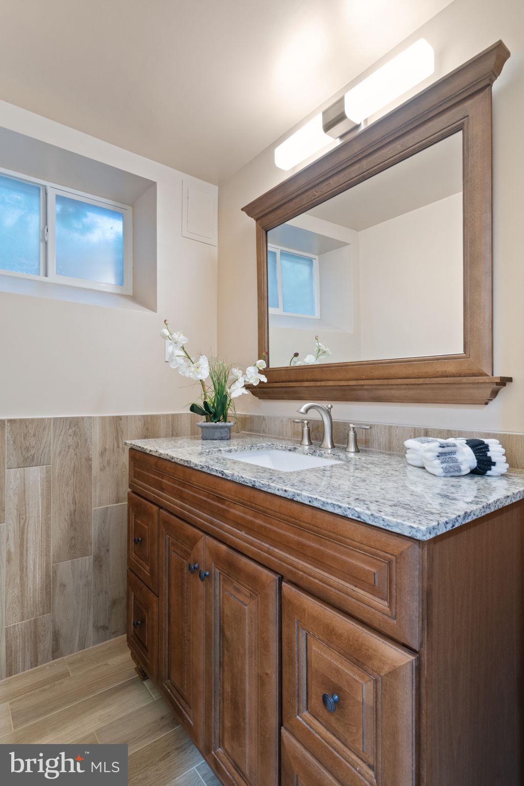 7619 Hayfield Road Alexandria, VA 22315 - Photo 44 of 60 Lower level remodeled full bath