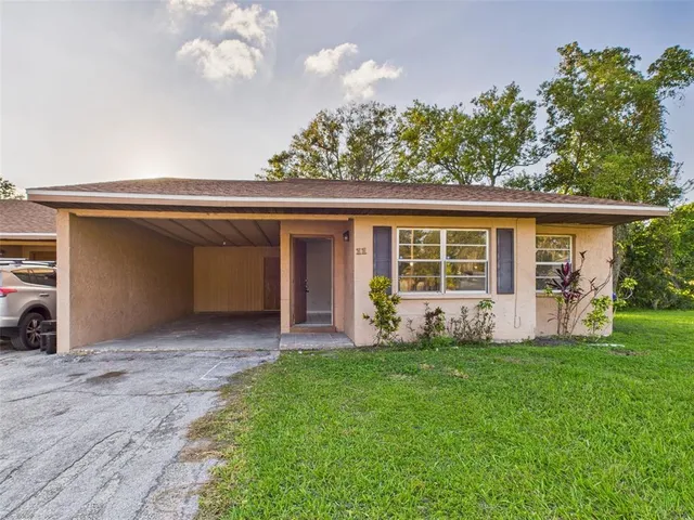 a house view with a garden space