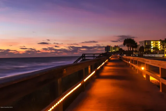 a view of city and swimming pool