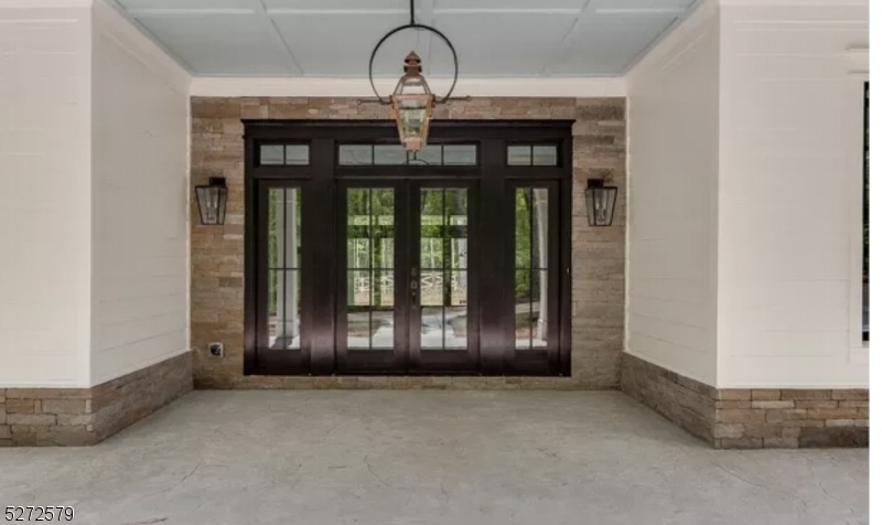 7 Settlers Ridge Court Port Murray, NJ 07865 - Photo 5 of 21 a view of an entryway door with a bench