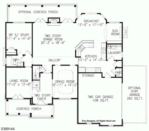 a front view of residential houses with yard and green space