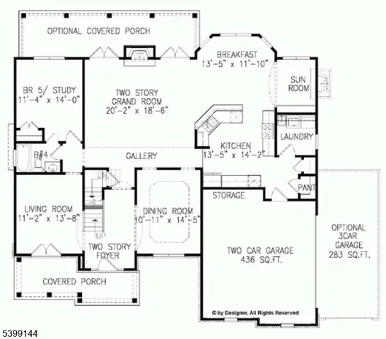 a front view of residential houses with yard and green space