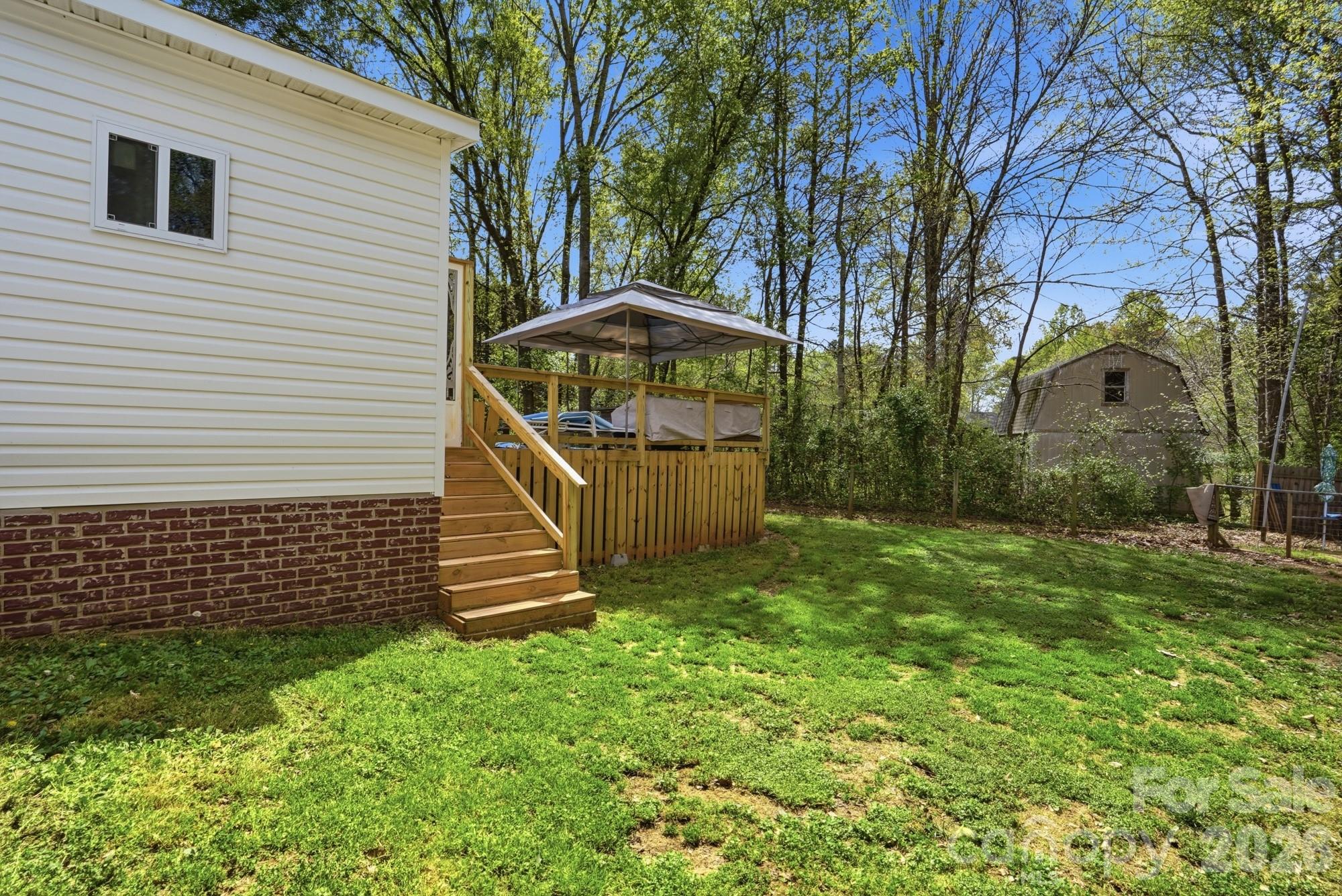 605 Ridgewood Court Mount Holly, NC 28120 - Photo 31 of 32 a view of a backyard with a garden