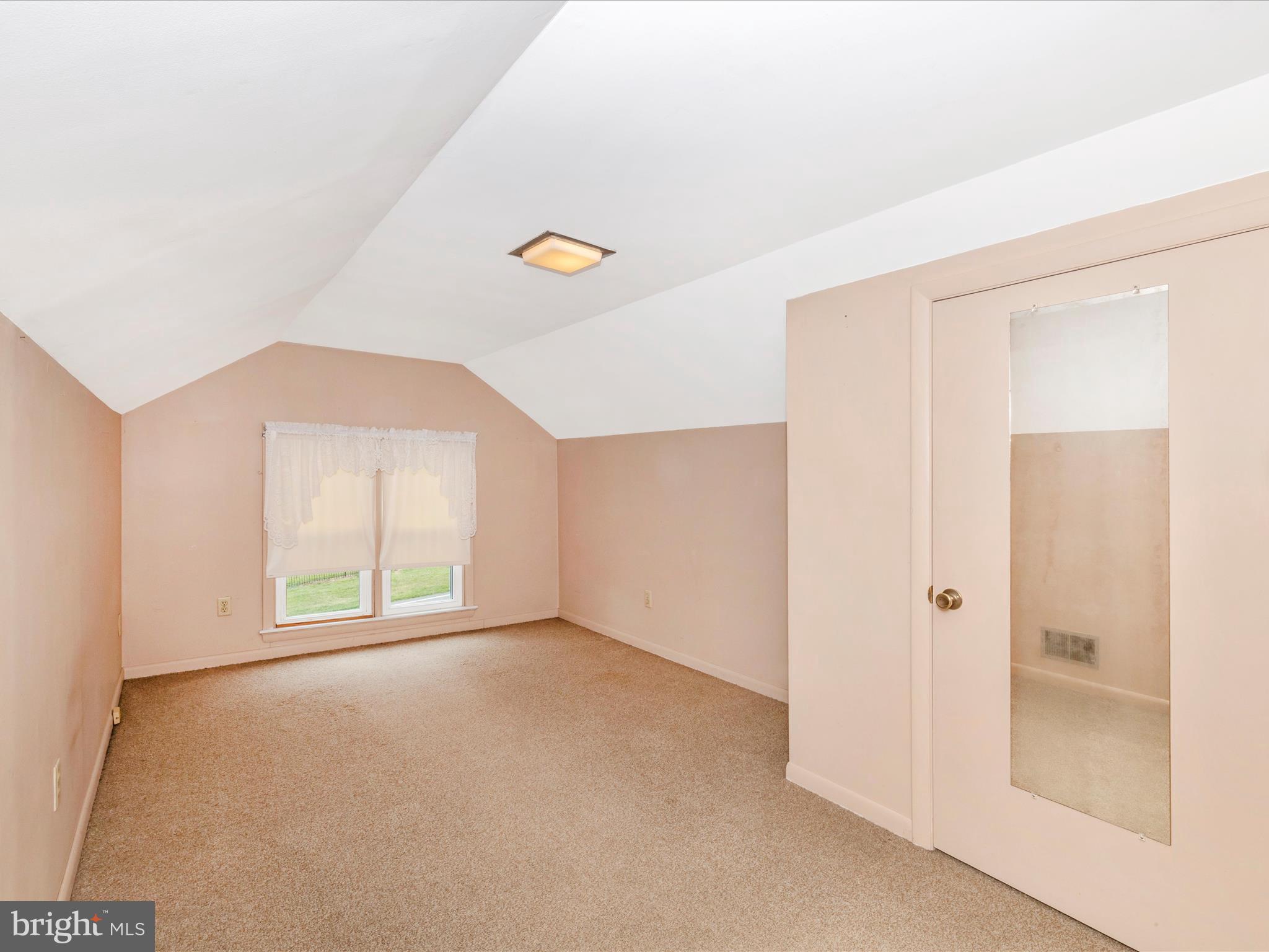 10018 Rocky Ridge Road Rocky Ridge, MD 21778 - Photo 36 of 53 an empty room with windows and closet