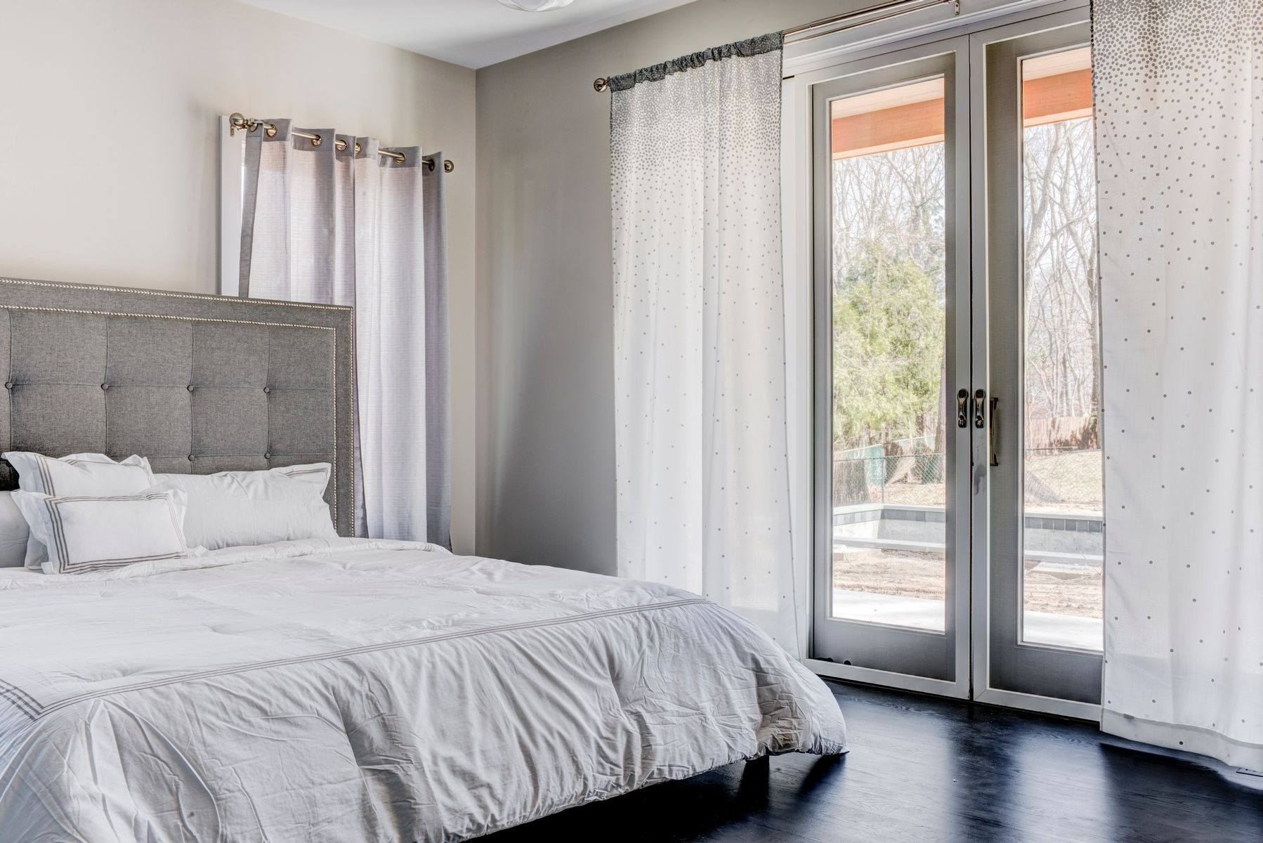 Undisclosed Address Sag Harbor, NY 11963 - Photo 9 of 11 a bedroom with a bed and a window