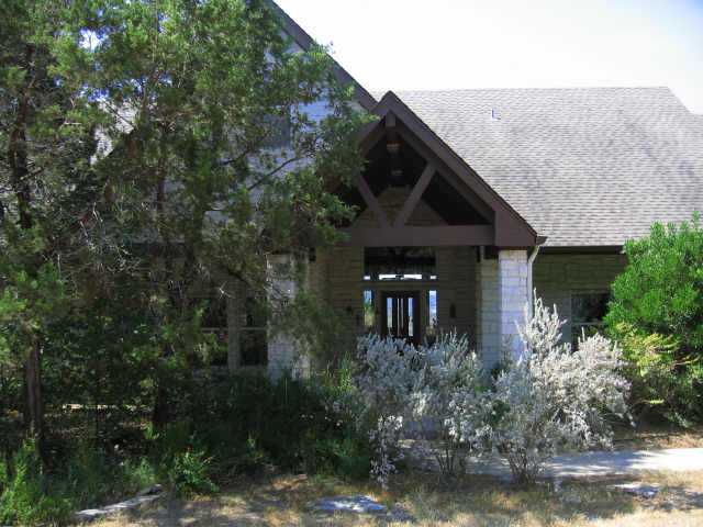 12410 Trails End Road Leander, TX 78641 - Photo 1 of 1 a front view of a house with garden