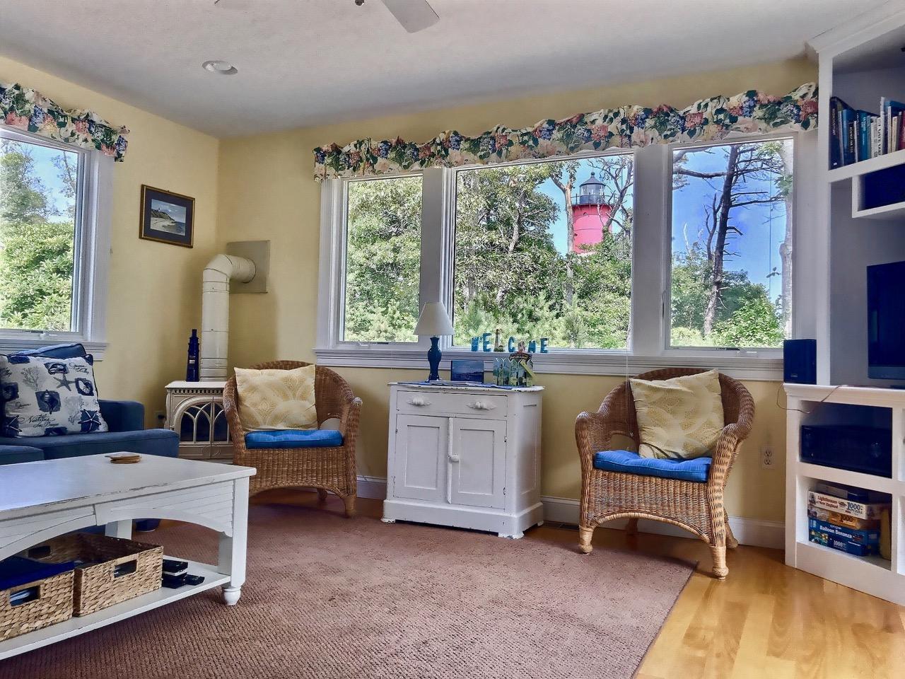 935 Cable Road Eastham, MA 02642 - Photo 24 of 35 a living room with furniture and a window