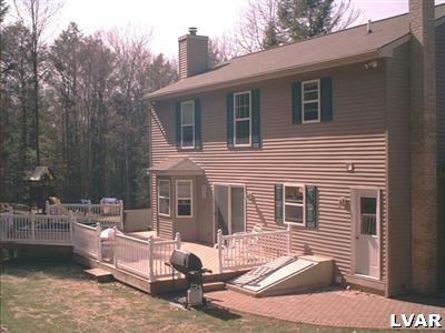 21 Roman Road Kunkletown, PA 18058 - Photo 2 of 8 a view of a patio with a table and chairs
