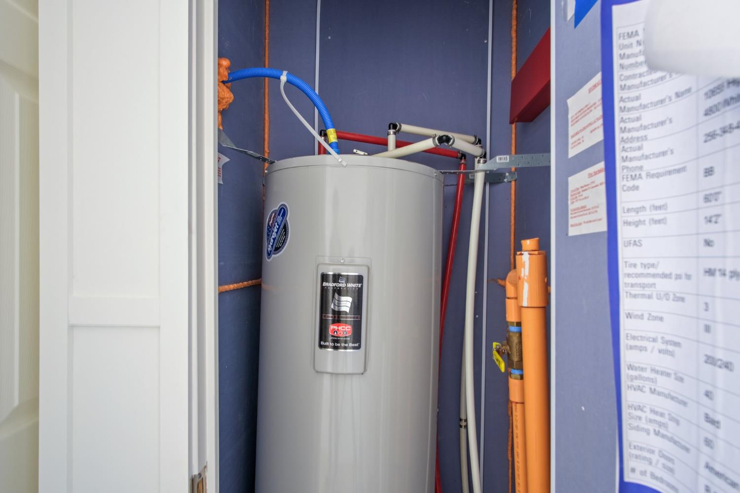 1400 Meredith Avenue, Unit 81 Gustine, CA 95322 - Photo 8 of 29 a white refrigerator freezer and a dishwasher