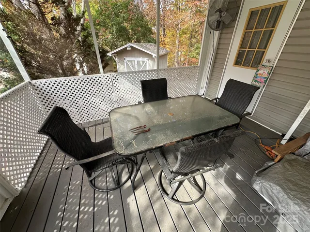 a roof deck view with a seating space