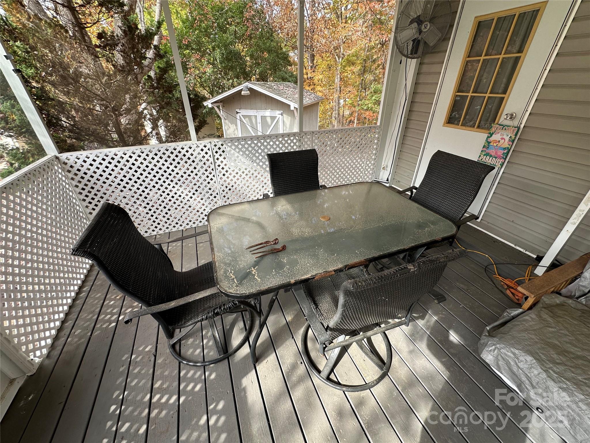 124 Hummingbird Circle New London, NC 28127 - Photo 18 of 48 a roof deck view with a seating space