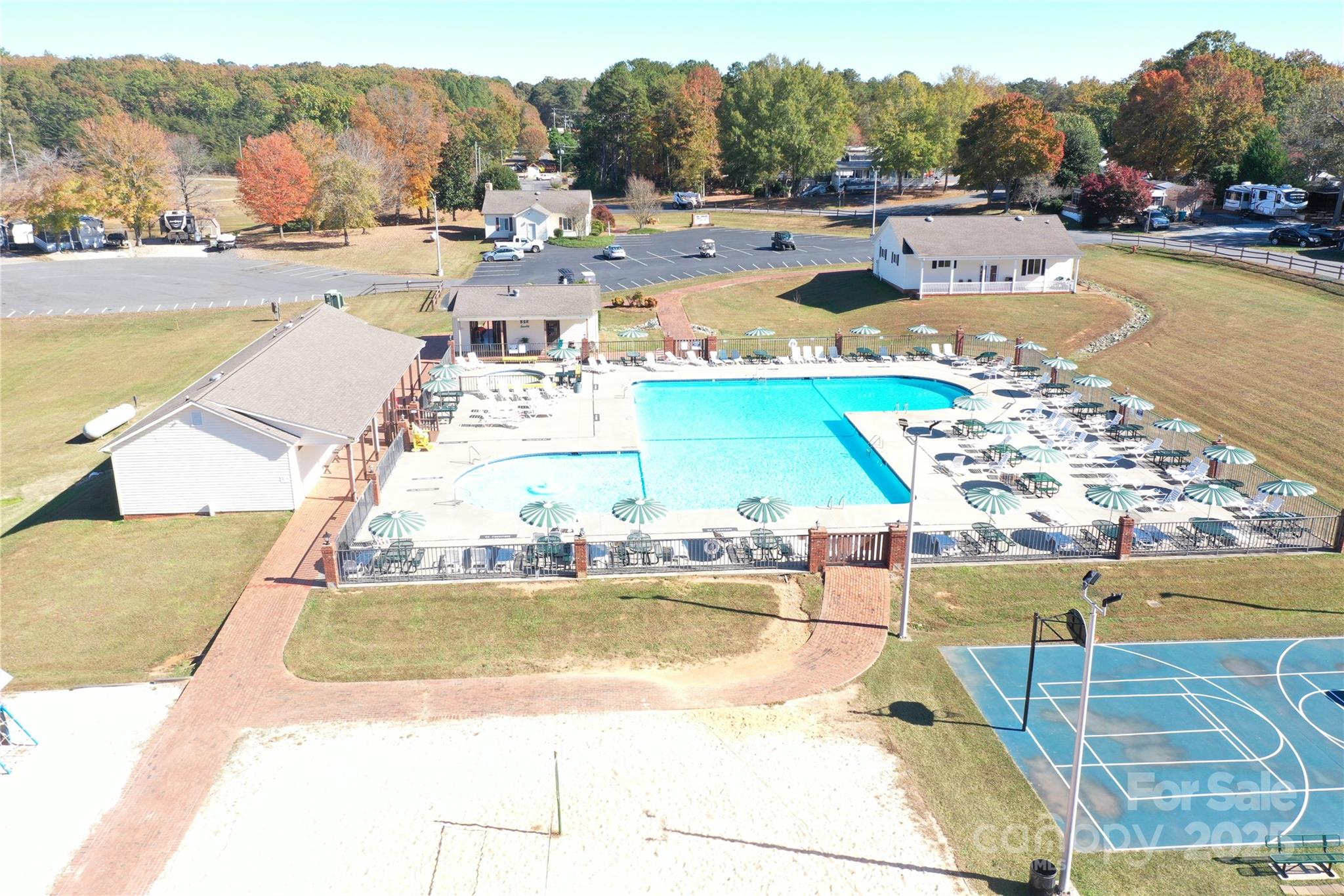 124 Hummingbird Circle New London, NC 28127 - Photo 45 of 48 a view of a swimming pool with an ocean view