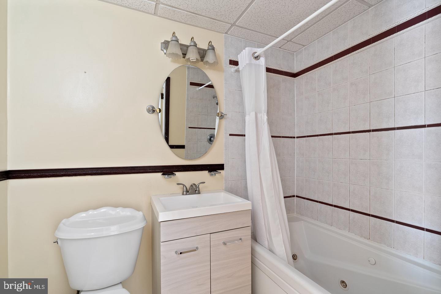 1225 South 2nd Street Philadelphia, PA 19147 - Photo 18 of 23 a bathroom with a toilet sink and vanity