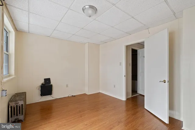 a view of a livingroom with wooden floor