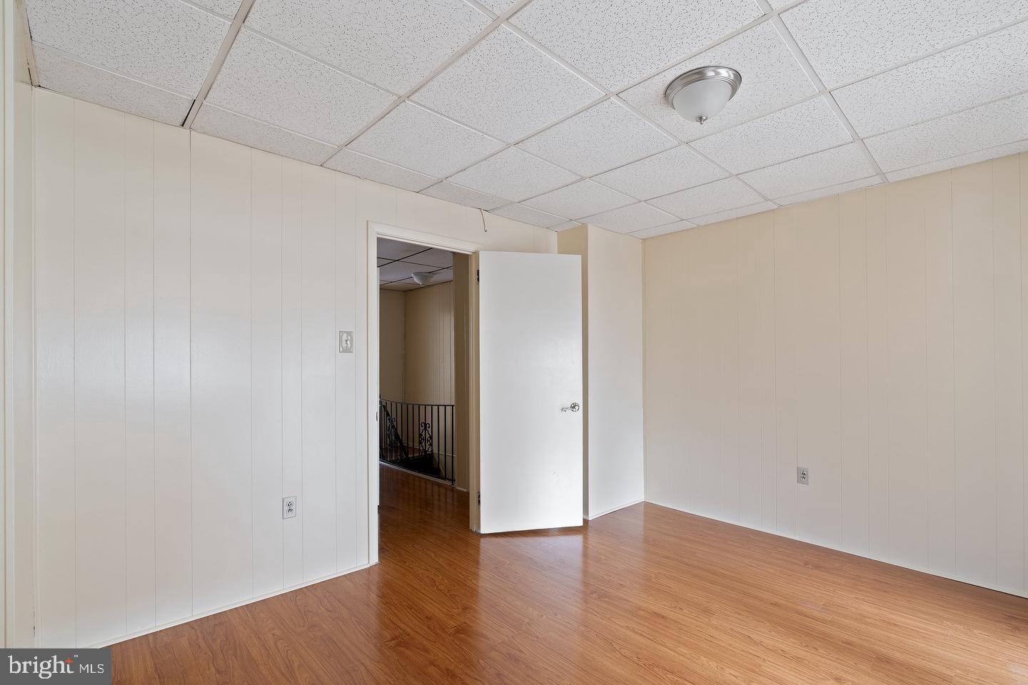 1225 South 2nd Street Philadelphia, PA 19147 - Photo 21 of 23 a view of an empty room with wooden floor