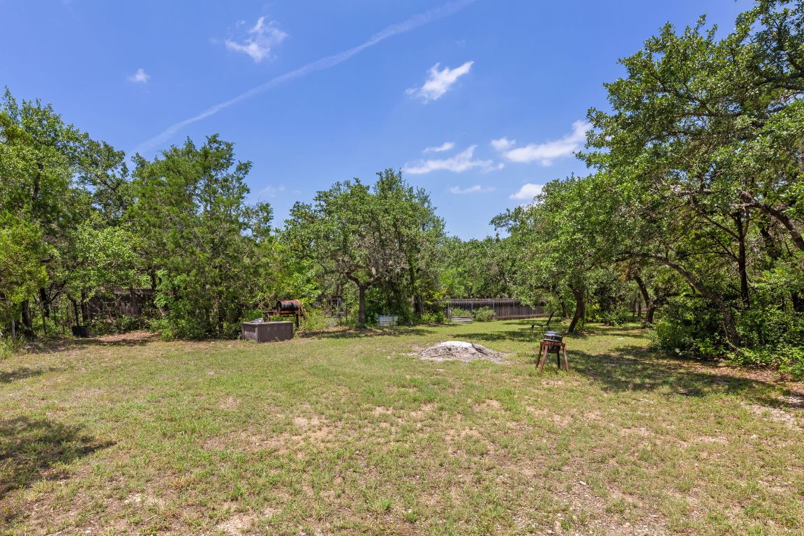 9005 Dorella Lane Austin, TX 78736 - Photo 31 of 38 a view of outdoor space with deck and yard