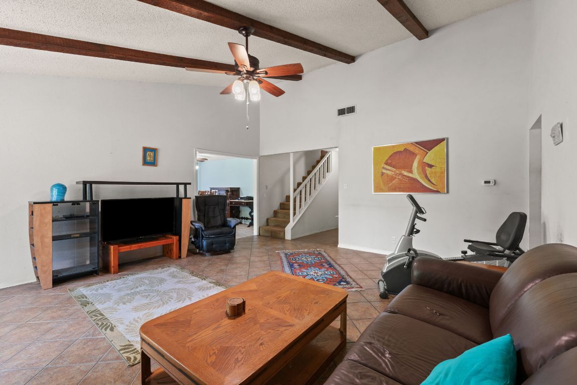 9005 Dorella Lane Austin, TX 78736 - Photo 7 of 38 a living room with furniture and a fireplace