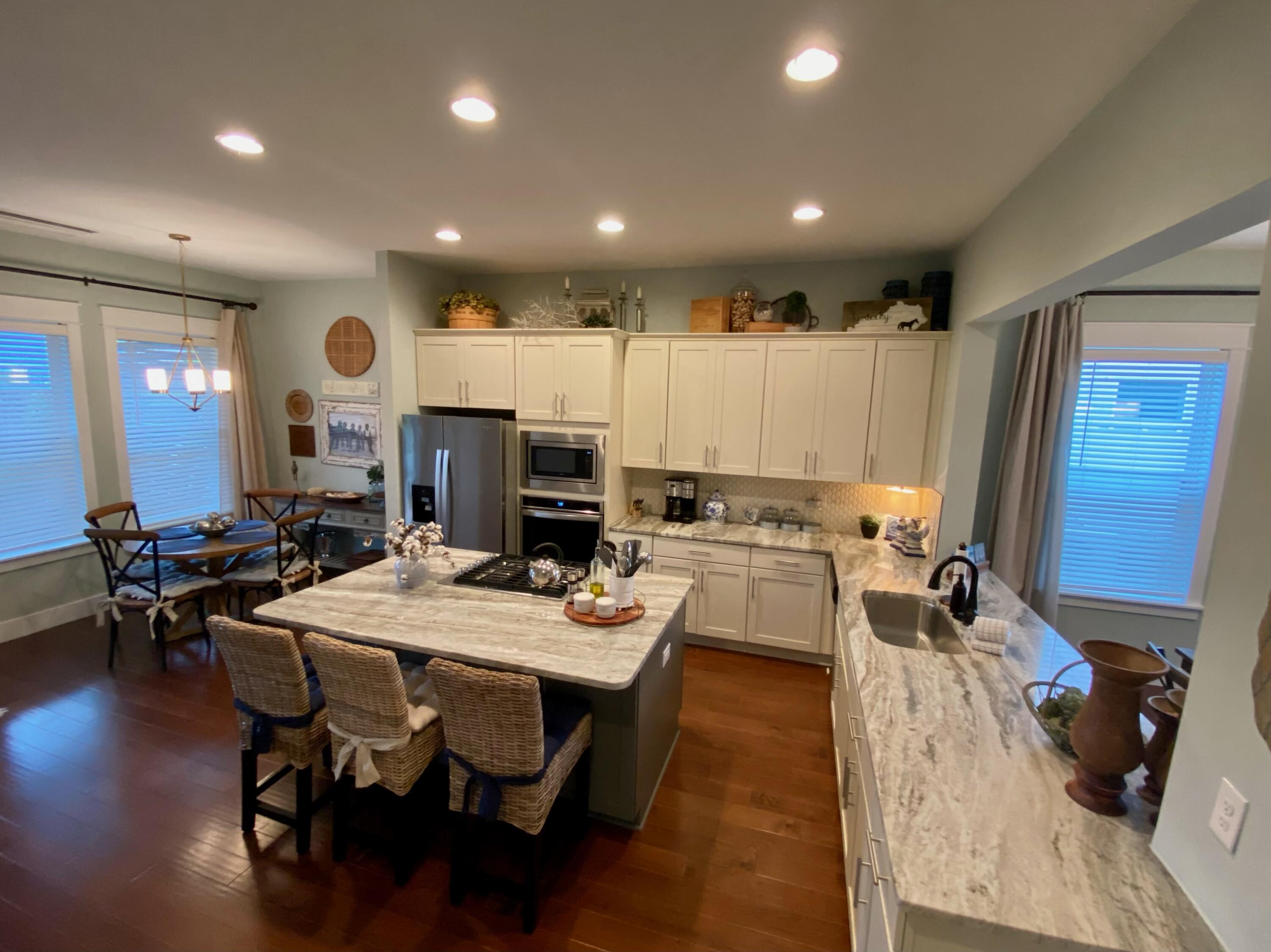 55 Valdare Way Inlet Beach Inlet Beach, FL 32461 - Photo 12 of 21 a large kitchen with a table and chairs