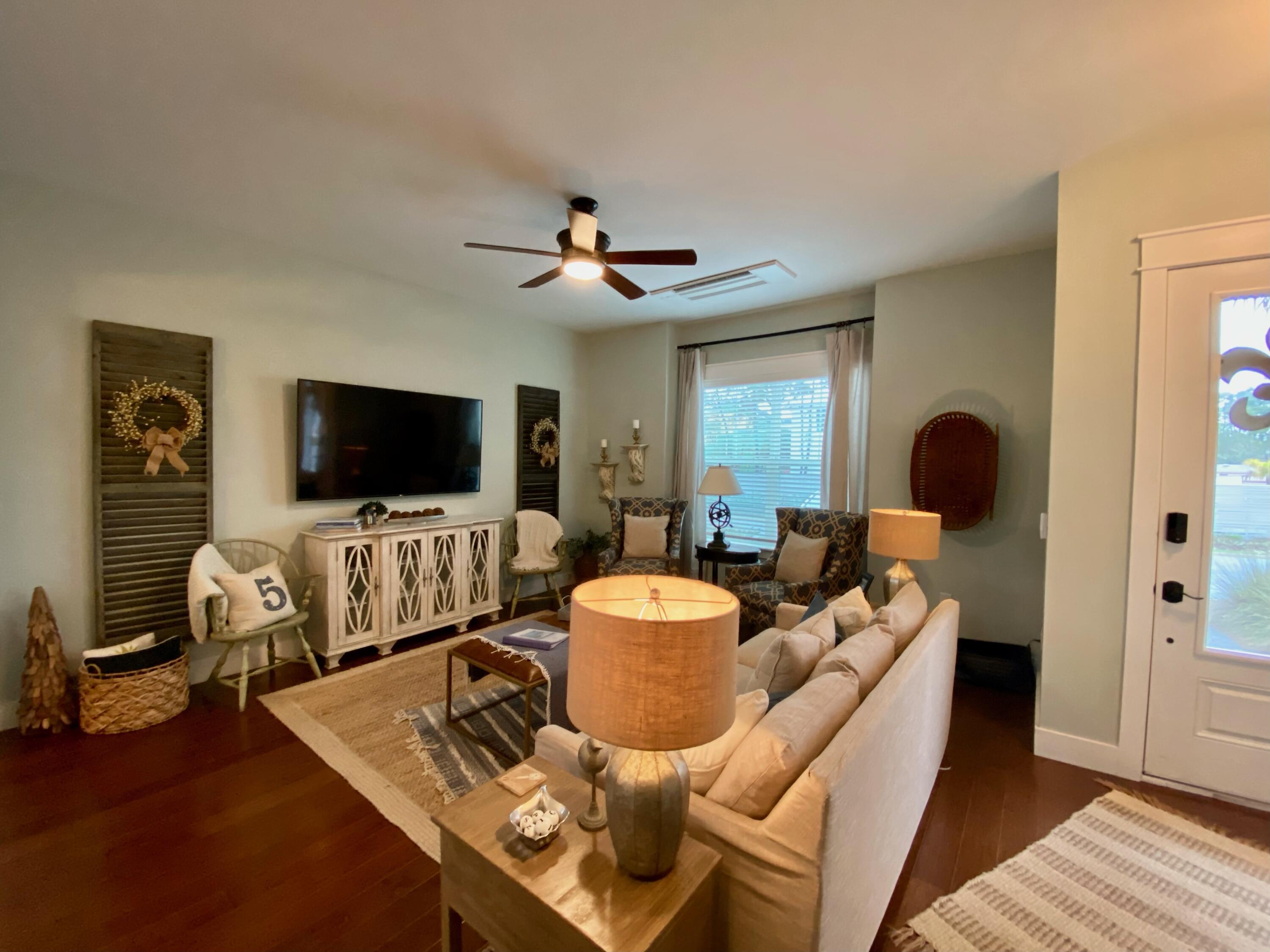55 Valdare Way Inlet Beach Inlet Beach, FL 32461 - Photo 17 of 21 a living room with furniture and a flat screen tv