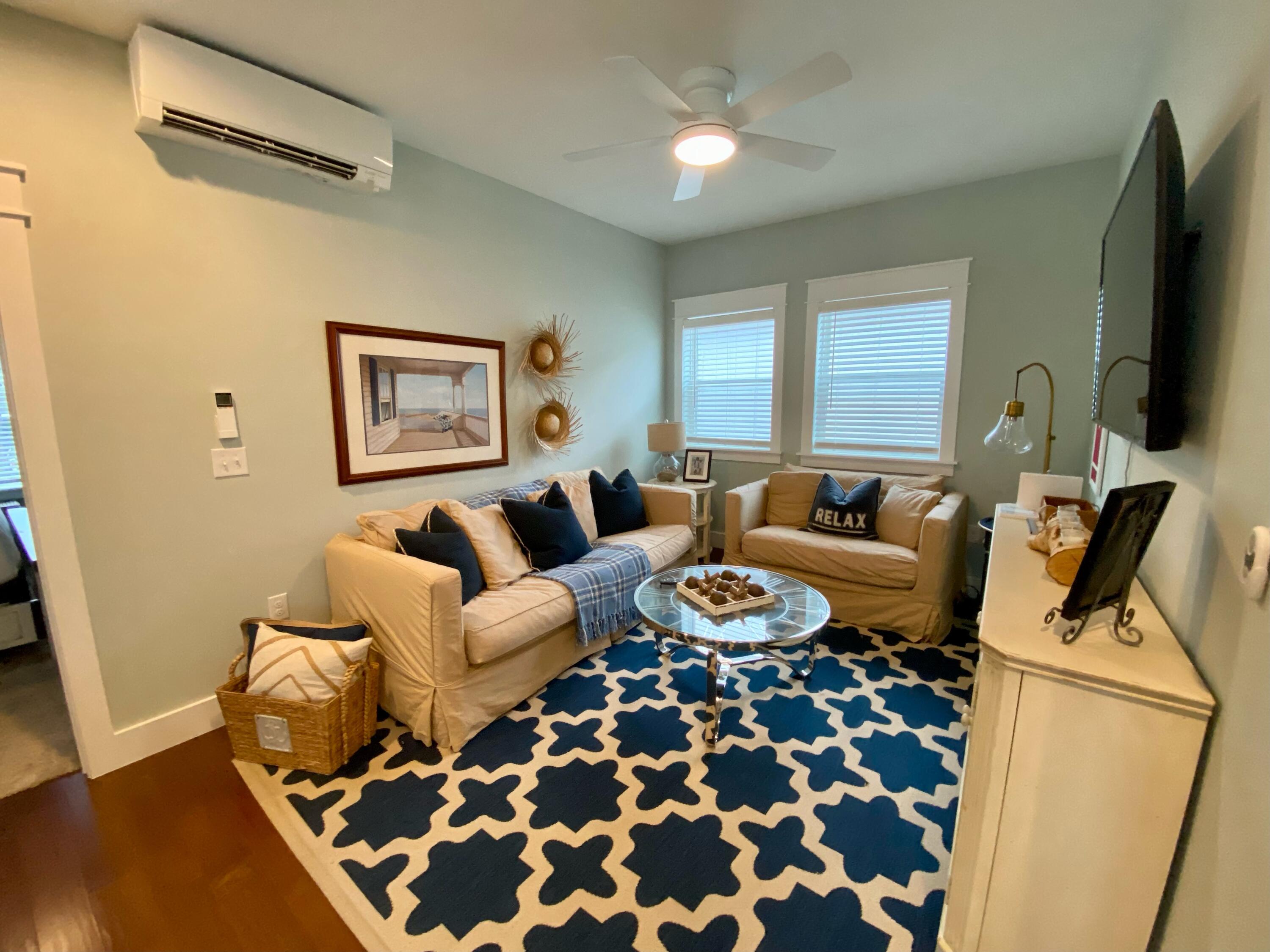 55 Valdare Way Inlet Beach Inlet Beach, FL 32461 - Photo 7 of 21 a living room with furniture and a flat screen tv
