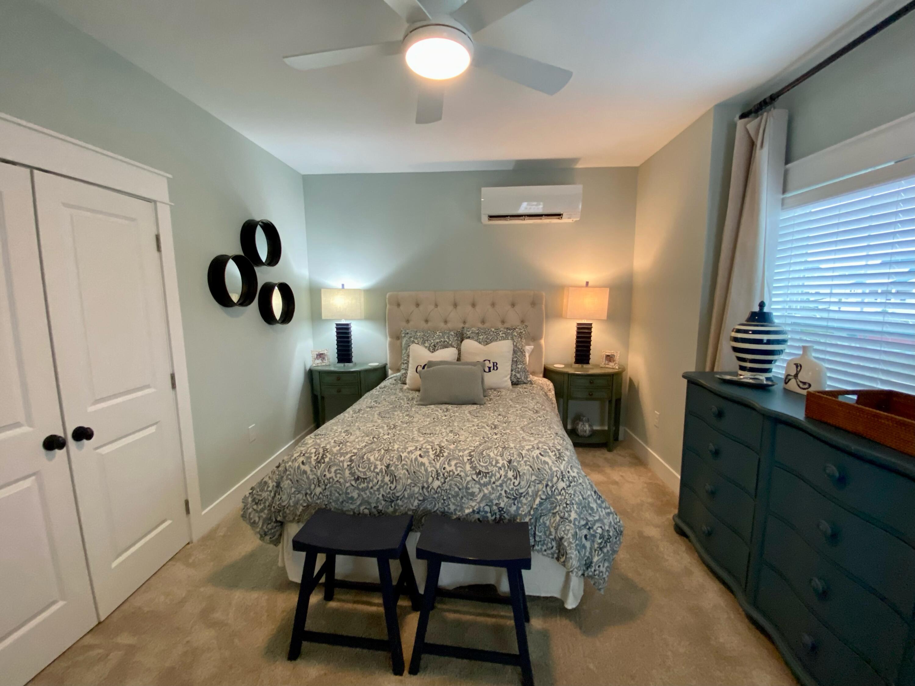 55 Valdare Way Inlet Beach Inlet Beach, FL 32461 - Photo 9 of 21 a bed room with a bed and a window