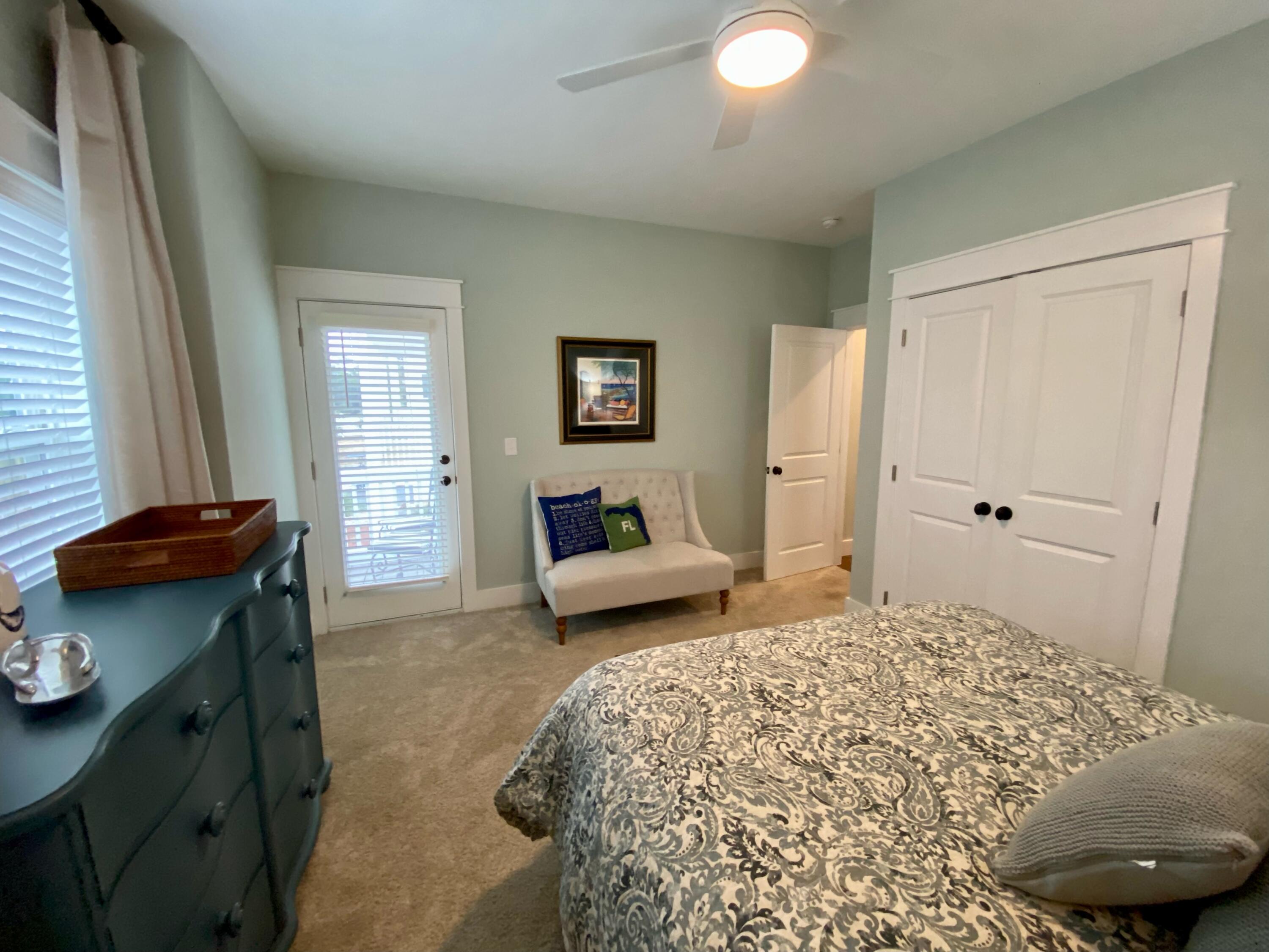 55 Valdare Way Inlet Beach Inlet Beach, FL 32461 - Photo 10 of 21 a bedroom with a bed and a dresser