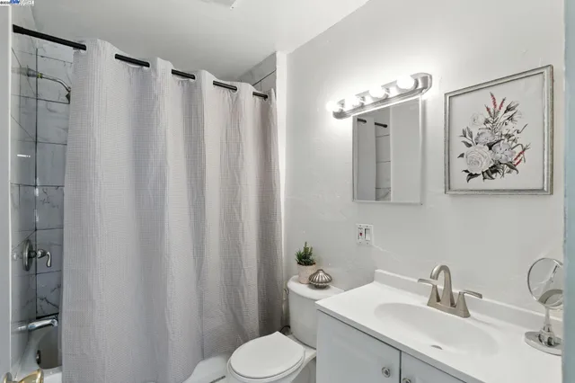 a view of a hallway with workspace