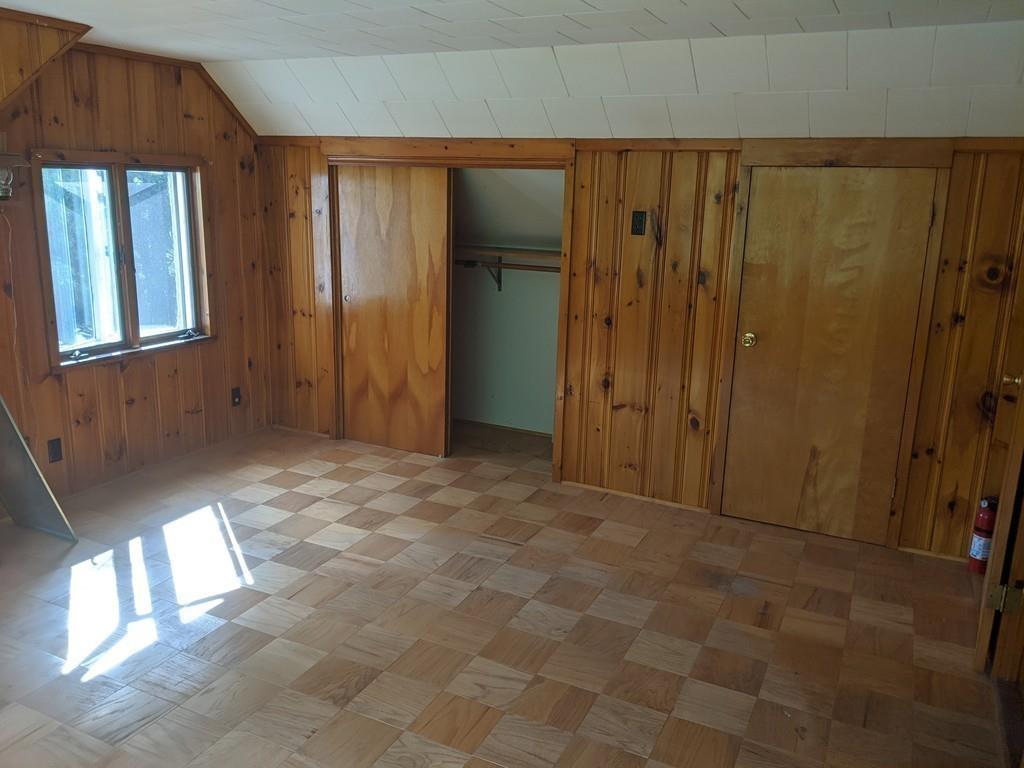 58 North Monson Road Hampden, MA 01036 - Photo 13 of 25 a view of an empty room with window and stairs