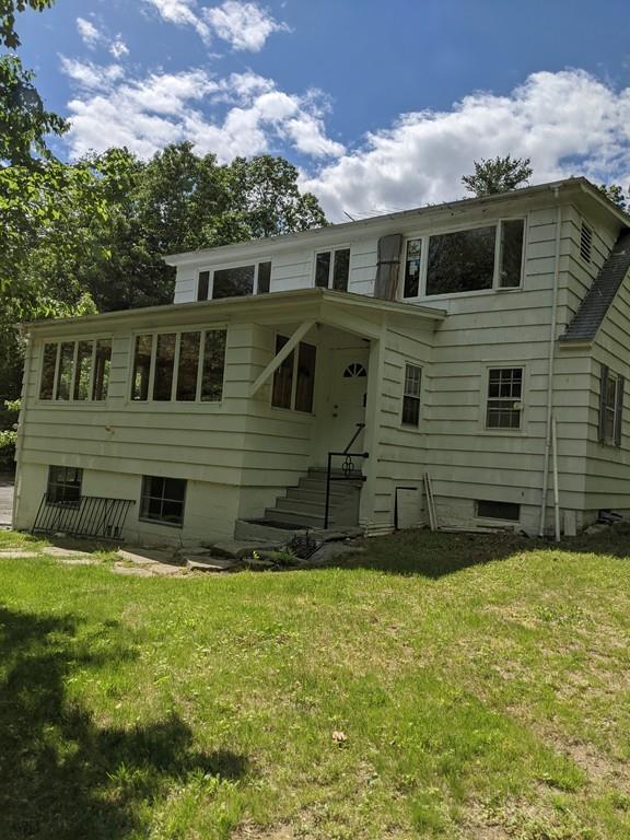 58 North Monson Road Hampden, MA 01036 - Photo 3 of 25 a view of a house with a yard