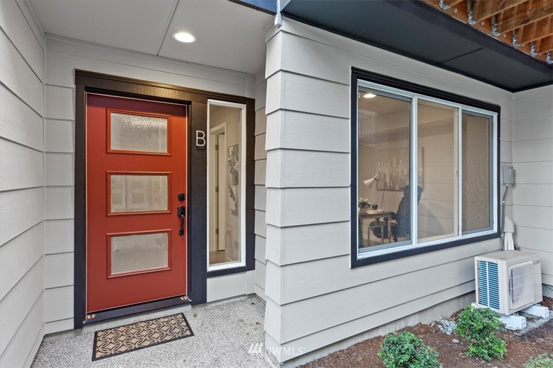 521 238th Place Southeast, Unit B Bothell, WA 98021 - Photo 2 of 21 a view of a door and a window