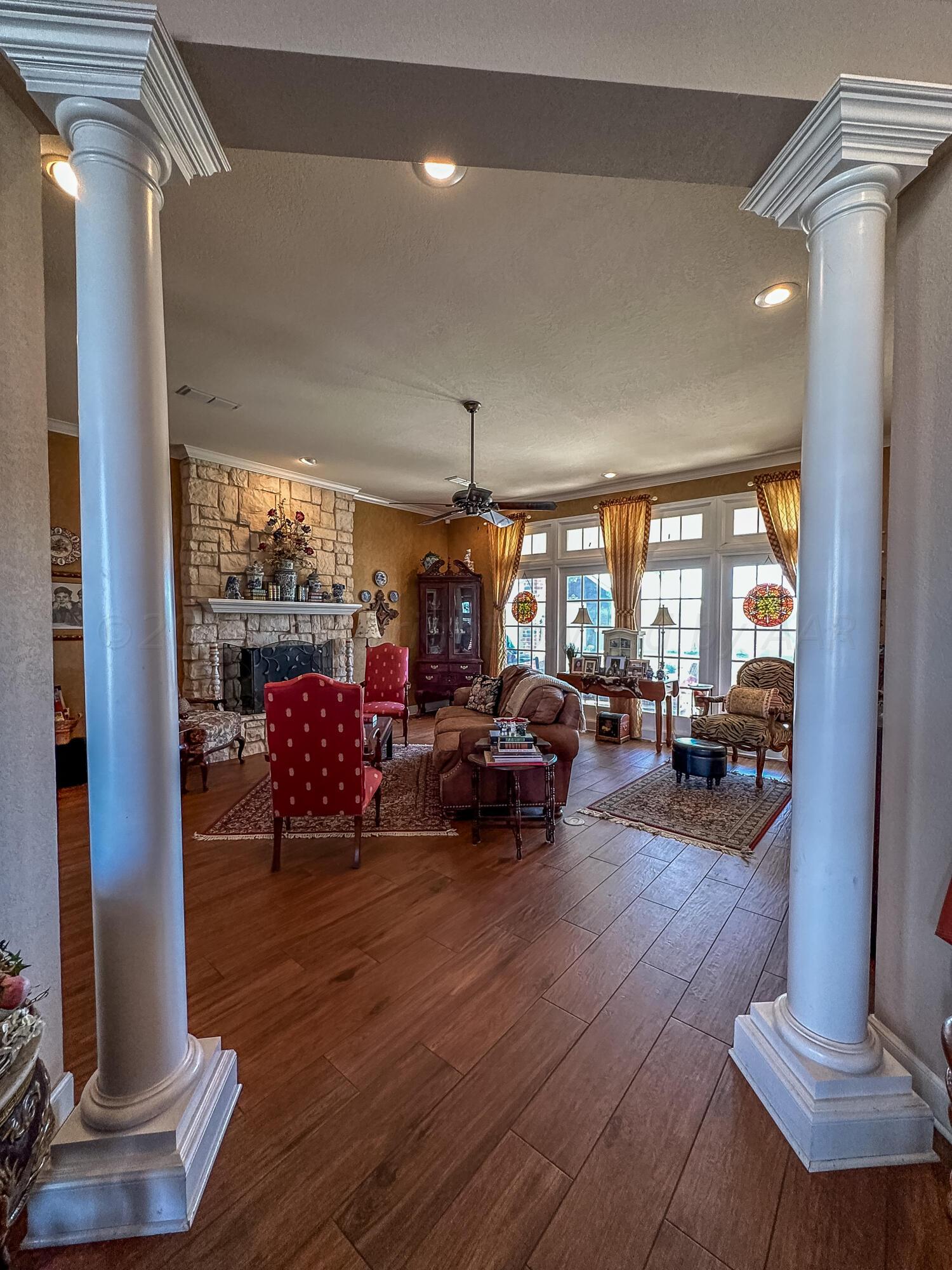105 St James Street Borger, TX 79007 - Photo 11 of 36 a living room with furniture and a large window