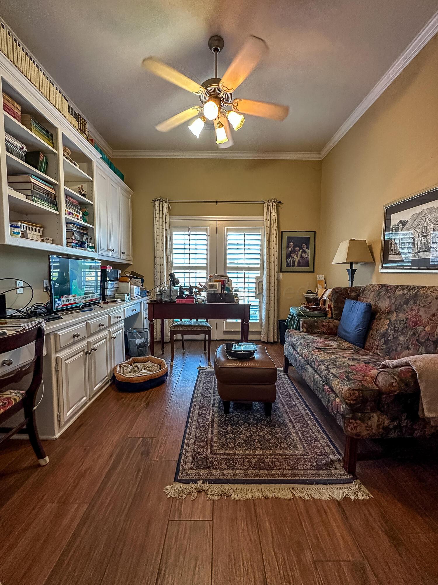 105 St James Street Borger, TX 79007 - Photo 21 of 36 a living room with furniture and wooden floor