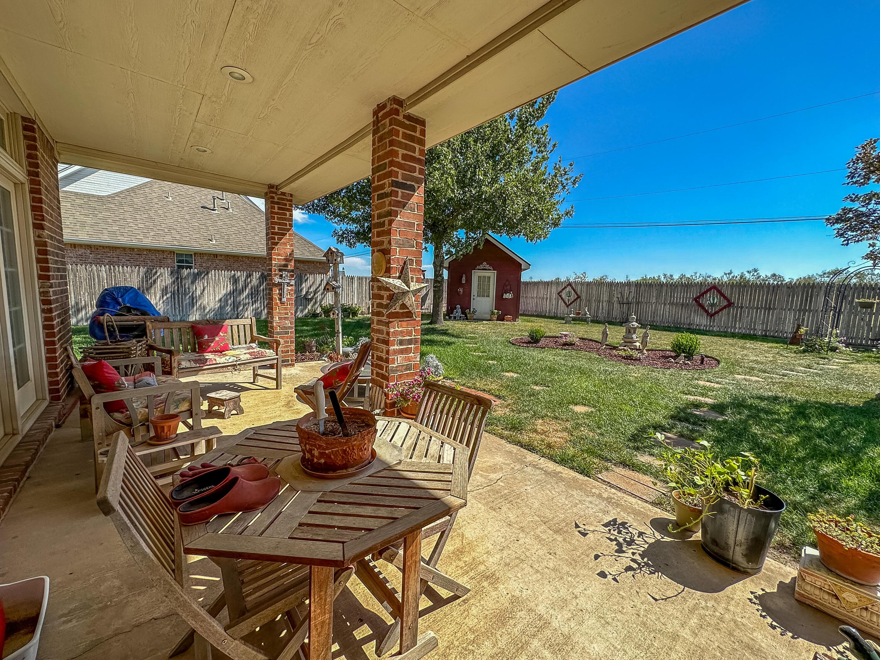 105 St James Street Borger, TX 79007 - Photo 35 of 36 a view of a backyard with sitting area
