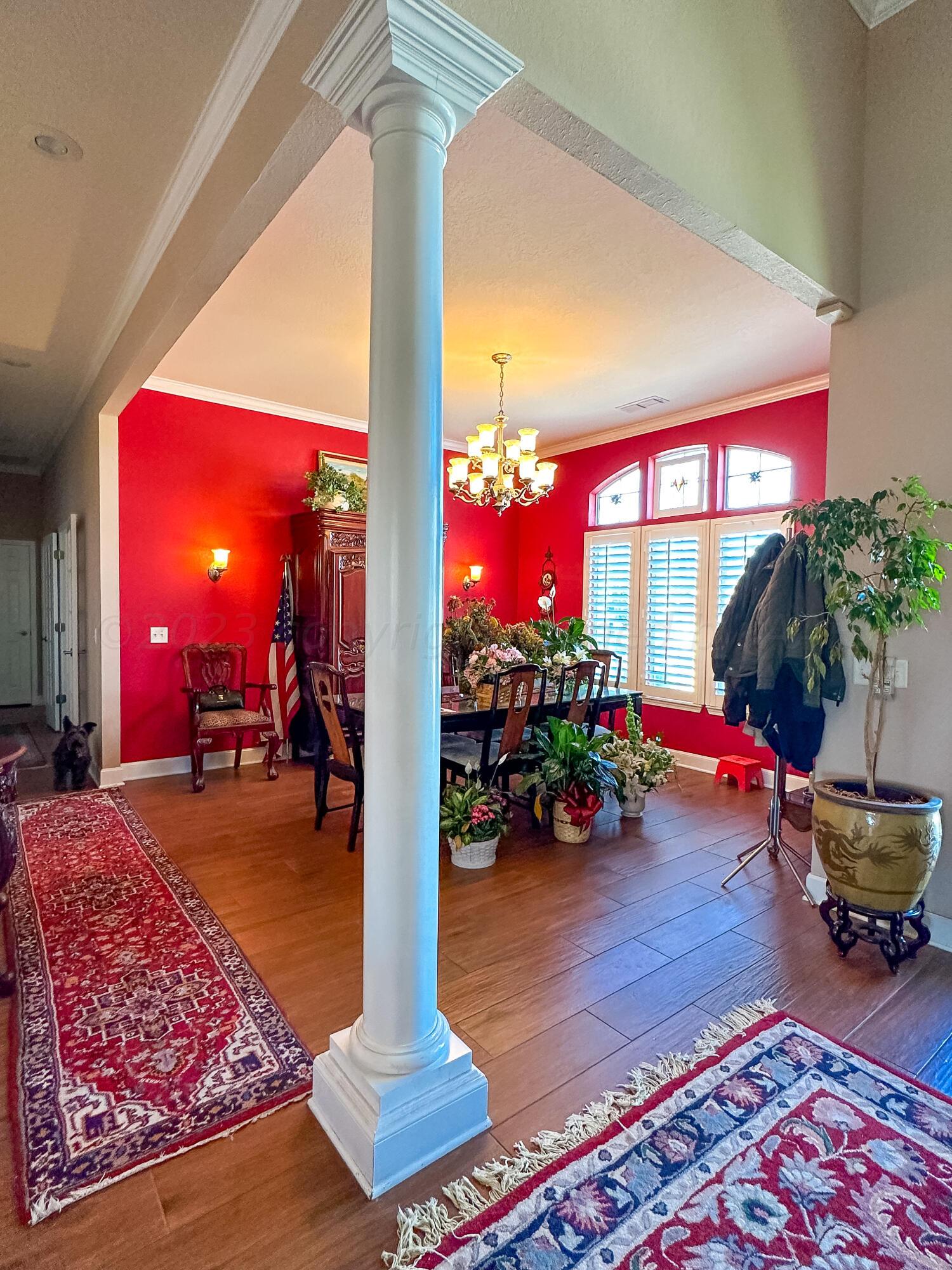105 St James Street Borger, TX 79007 - Photo 10 of 36 a living room with furniture a rug and a table