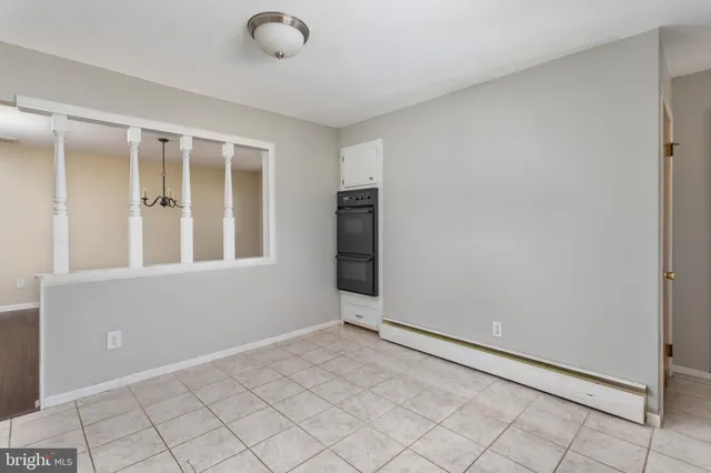 a bathroom with a granite countertop bathtub and a sink