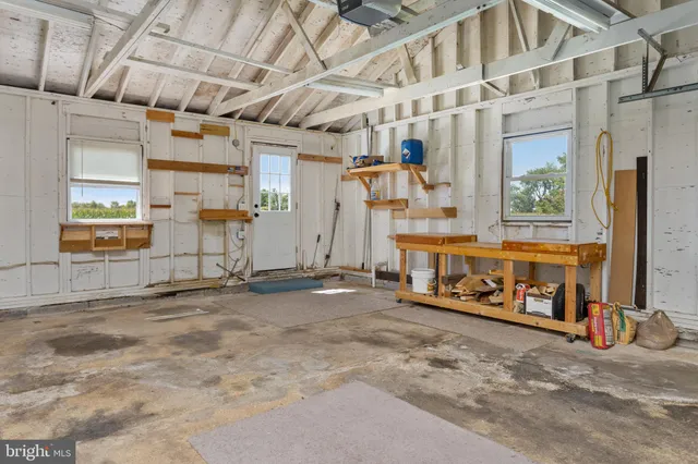 a fire hydrant in middle of a field