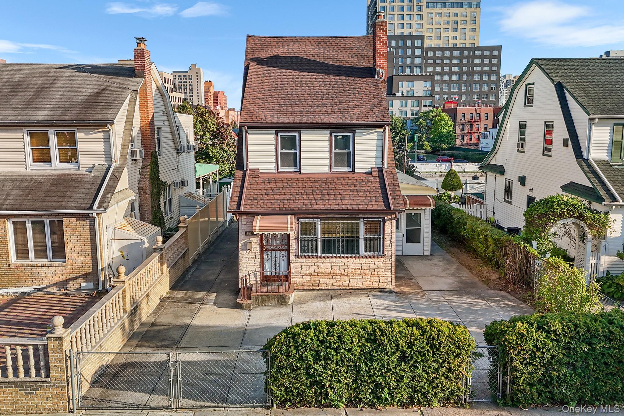front view of a house with a small yard