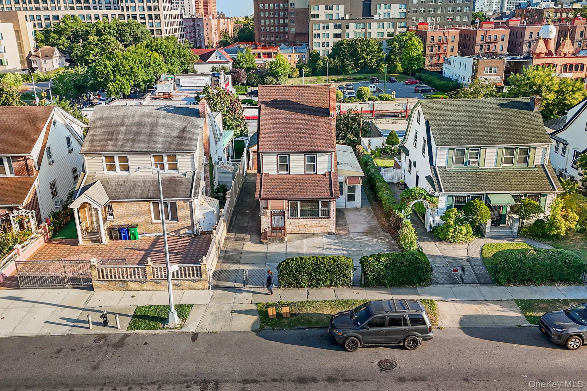 150-44 87th Road Queens, NY 11432 - Photo 2 of 35 an aerial view of a house with a garden and plants