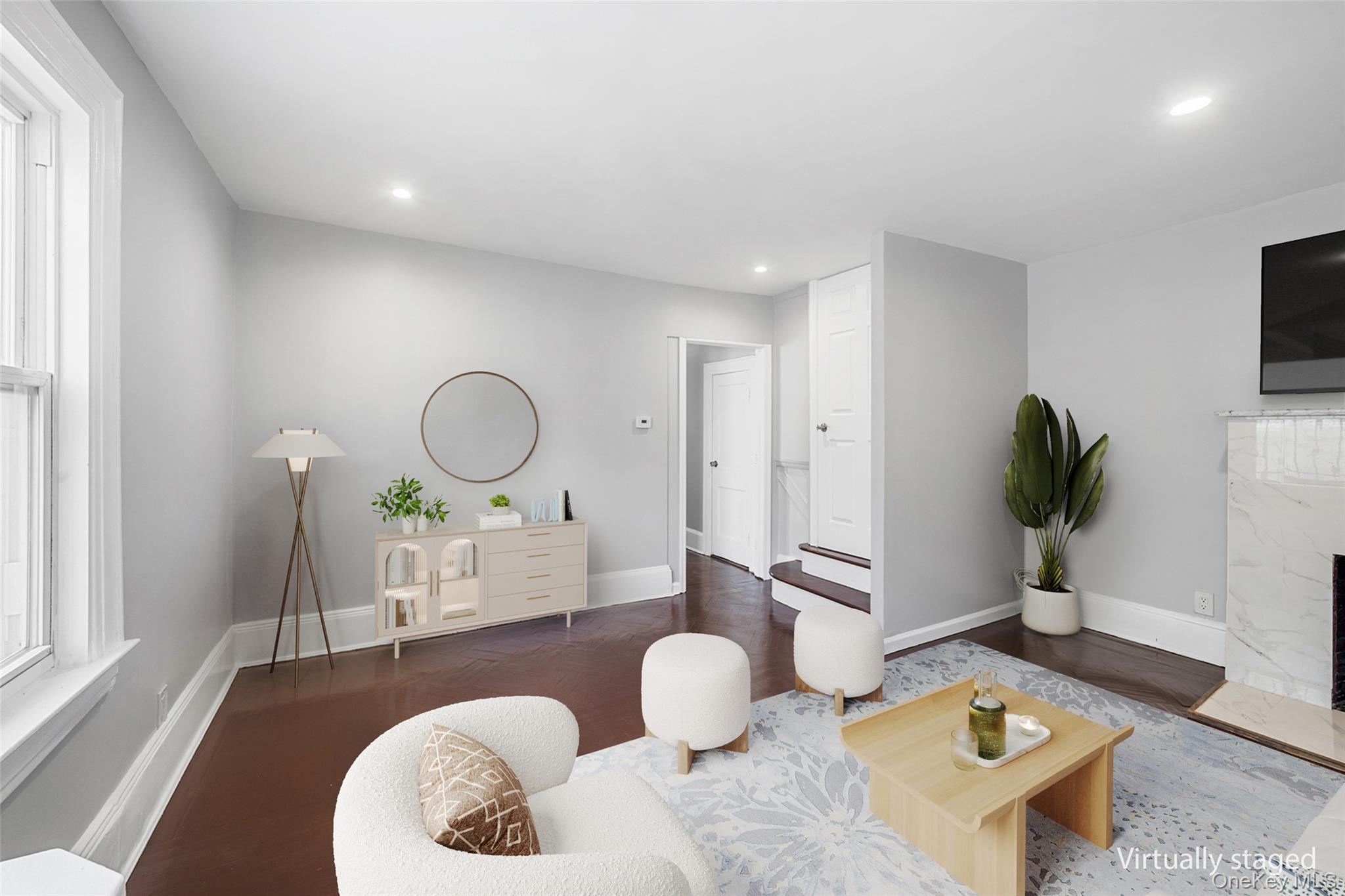 150-44 87th Road Queens, NY 11432 - Photo 7 of 35 a living room with furniture and a potted plant