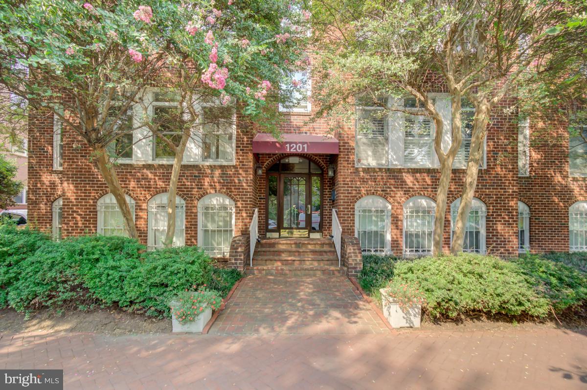 1201 O Street Northwest, Unit 2A Washington, DC 20005 - Photo 2 of 31 a front view of a house with garden