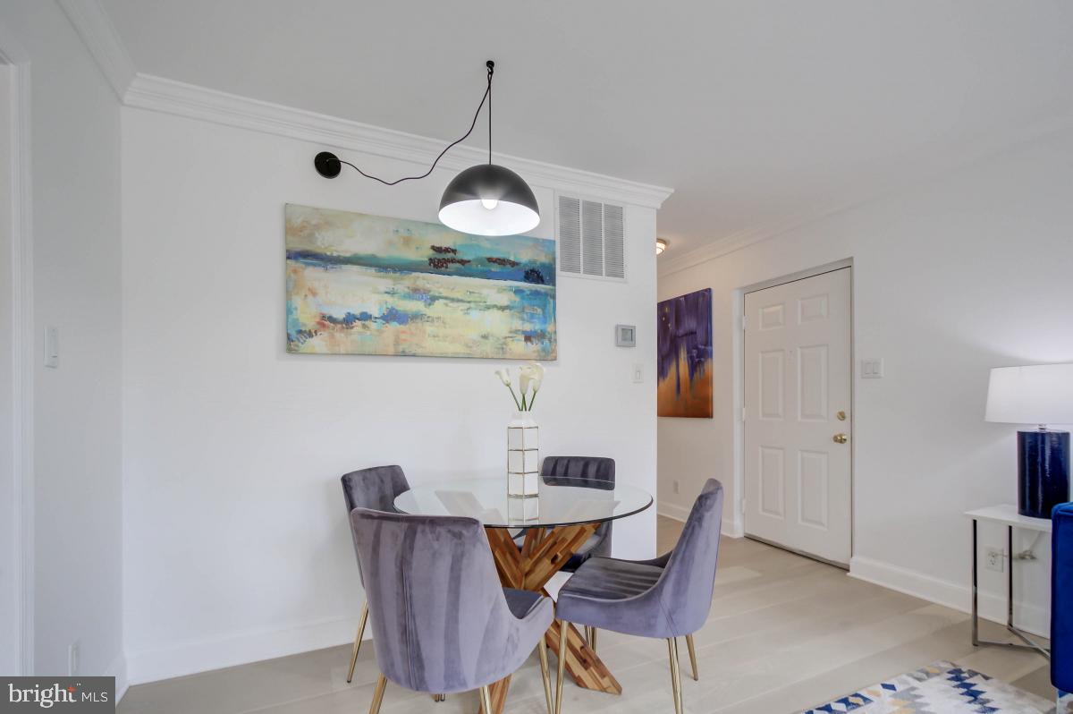 1201 O Street Northwest, Unit 2A Washington, DC 20005 - Photo 12 of 31 a view of a dining room with furniture