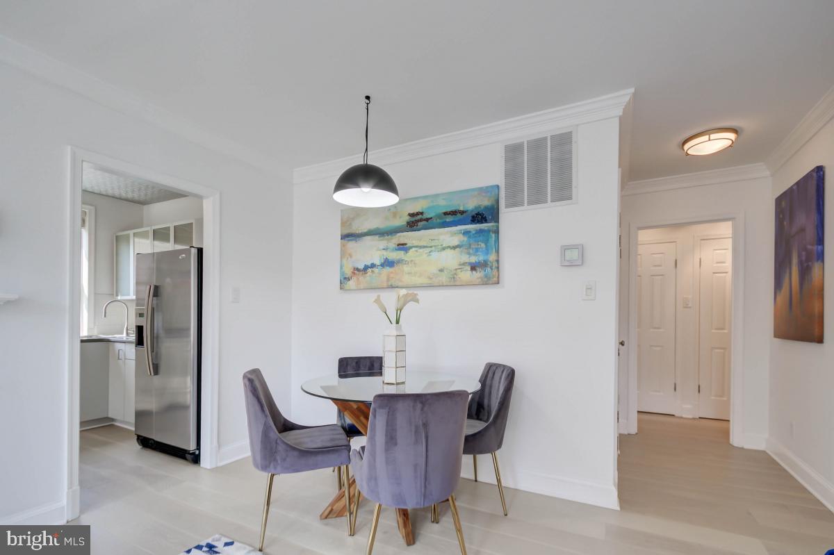 1201 O Street Northwest, Unit 2A Washington, DC 20005 - Photo 13 of 31 a view of a dining room with furniture