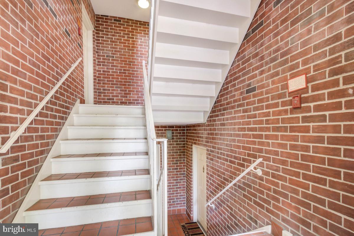 1201 O Street Northwest, Unit 2A Washington, DC 20005 - Photo 4 of 31 a view of a brick wall with stairs