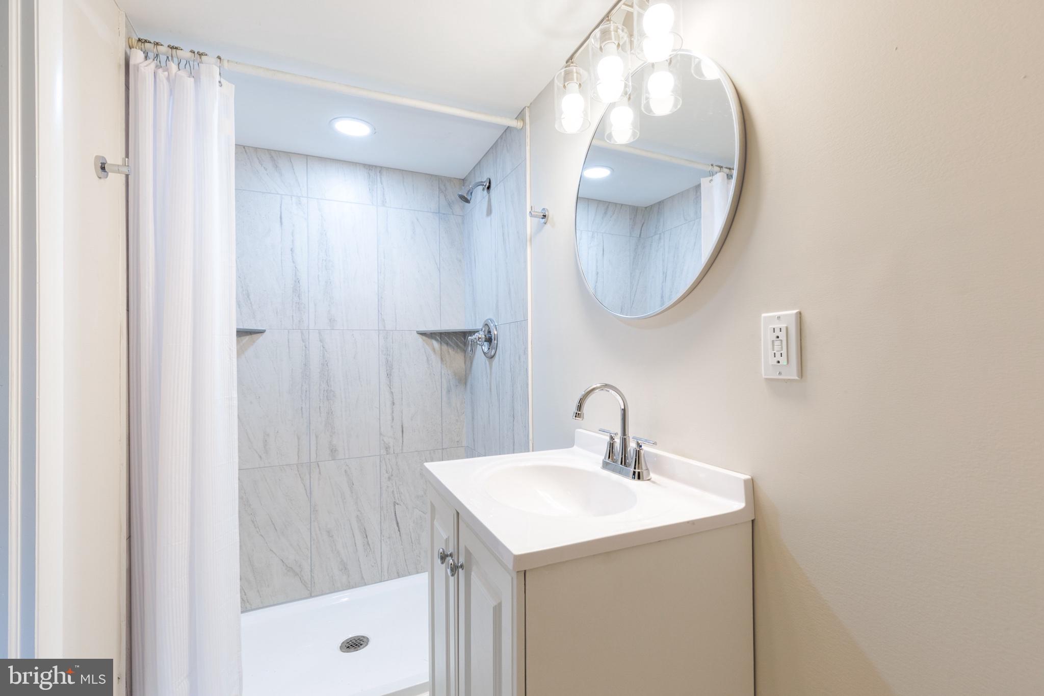 8306 Berkfield Road Baltimore, MD 21237 - Photo 22 of 29 New Modern bathroom with sleek design.