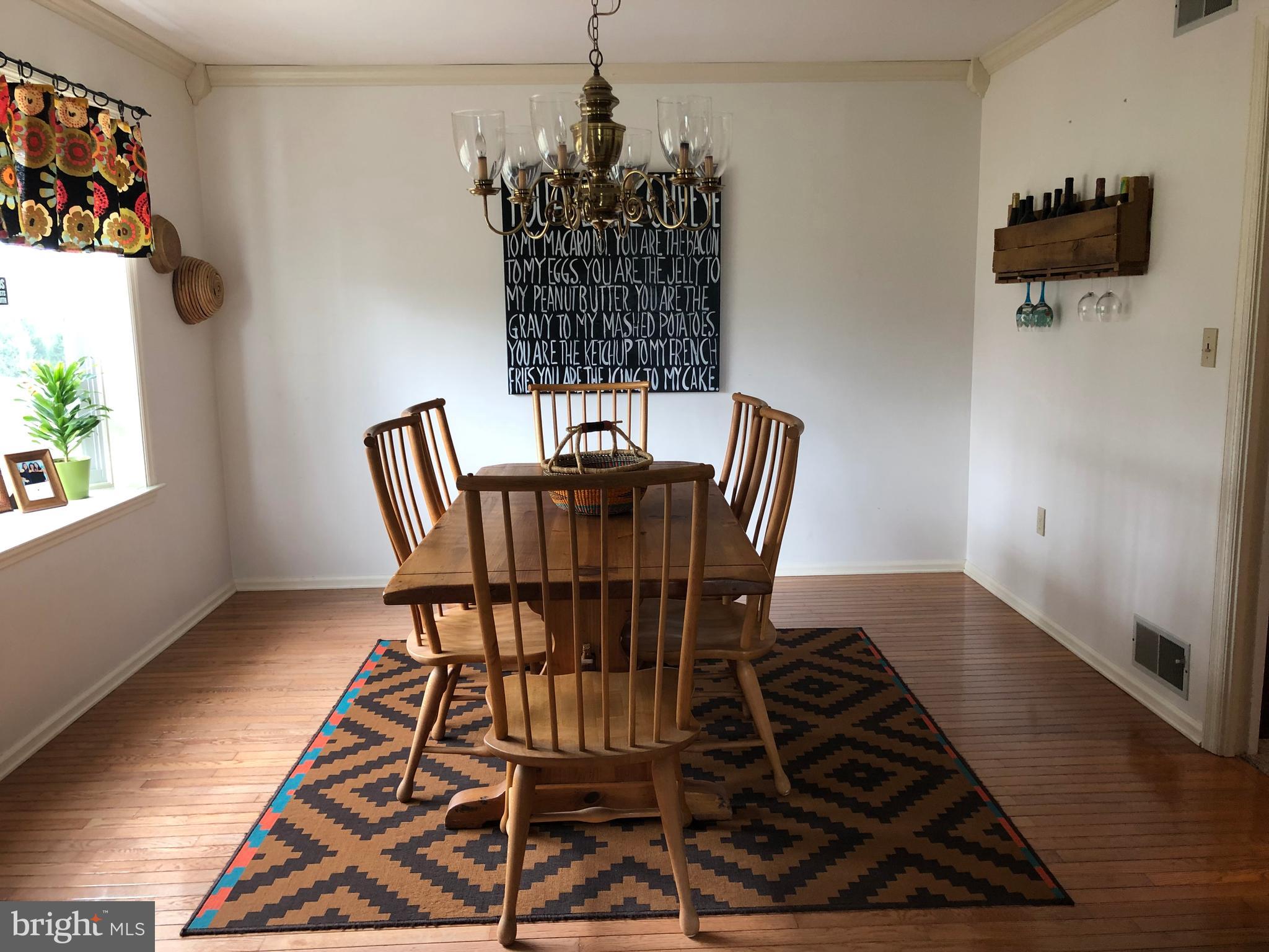 135 Martzall Road Denver, PA 17517 - Photo 12 of 26 Formal dining room, bay window and pocket door