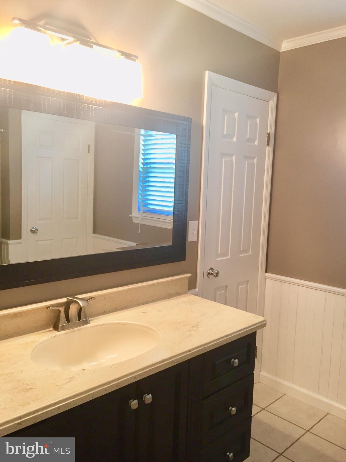 135 Martzall Road Denver, PA 17517 - Photo 20 of 26 Upstairs bath, door to master, linen closet