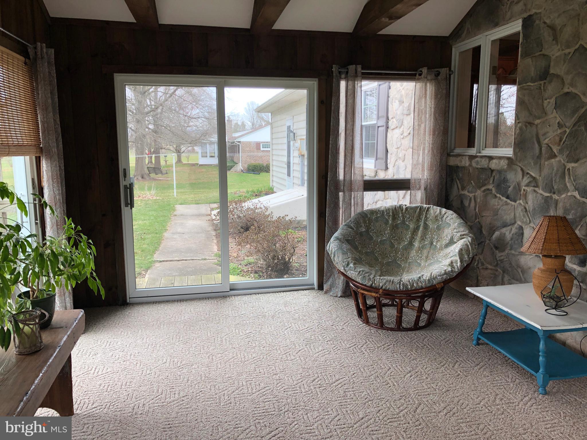 135 Martzall Road Denver, PA 17517 - Photo 23 of 26 Sun room, doors to outside, carpet